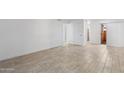 Open living space featuring tile flooring, neutral walls, and plenty of natural light at 2220 W Dora St # 129, Mesa, AZ 85201
