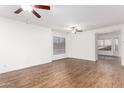 Spacious living room with hardwood floors and a large window at 2875 W Highland St # 1213, Chandler, AZ 85224