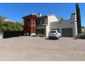 Exterior view of the property, featuring distinct architectural design, parking, and landscaping at 639 W Us Highway 60 Hwy, Superior, AZ 85173