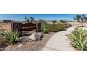 Arroyo Grande community sign surrounded by lush desert landscaping and manicured grounds at 1187 E Ridgerock St, Casa Grande, AZ 85122