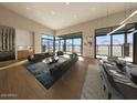 Spacious living room with a fireplace and mountain views at 39347 N Old Stage Rd, Cave Creek, AZ 85331