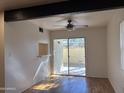 Bright living area featuring sliding glass doors leading to patio at 6542 N 7Th Ave # 30, Phoenix, AZ 85013