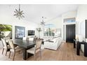 Bright and airy living room featuring vaulted ceilings and lots of natural light at 9246 N 108Th St, Scottsdale, AZ 85259