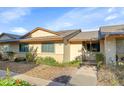 Inviting home exterior showcasing a well-kept facade and low maintenance landscaping at 18655 N Palomar Dr, Sun City West, AZ 85375