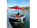Included Donut Boat on the lake allows for relaxing and fun experiences with friends and Gathering at 517 S Marina Dr, Gilbert, AZ 85233