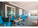 Inviting front porch with comfortable seating and stylish decor offering a welcoming entrance at 11215 N 37Th Ave, Phoenix, AZ 85029