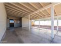 Large covered parking area featuring direct access to home at 1660 W 7Th Pl, Mesa, AZ 85201