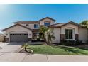 Charming two-story home with a landscaped yard and inviting curb appeal at 3529 E Fandango Dr, Gilbert, AZ 85298