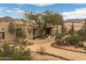 Beautiful Southwestern-style home featuring desert landscaping and a charming, private courtyard at 8540 E Mcdowell Rd # 125, Mesa, AZ 85207