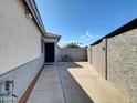 View of the backyard, showing the outdoor space between homes at 5255 W Cochise Dr, Glendale, AZ 85302