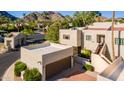 A modern two-story home with a private garage and desert landscaping in a beautiful neighborhood at 6229 N 30Th Way, Phoenix, AZ 85016
