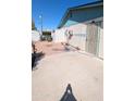 This backyard features a concrete patio and plenty of space for outdoor activities at 1116 E 11Th E St, Casa Grande, AZ 85122