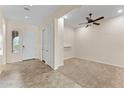 View of the entryway with a white door and mixed flooring at 13110 W Avenida Del Rey --, Peoria, AZ 85383