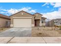 Charming single-Gathering home with a 2-car garage and a low-maintenance desert-style front yard at 17081 W Seldon Ln, Waddell, AZ 85355
