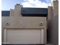 A well maintained home featuring a one car garage with a modern architectural style at 3030 N Hayden Rd # 28, Scottsdale, AZ 85251