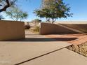 Private outdoor patio space with brick accents at 1606 E Cactus Wren Dr, Phoenix, AZ 85020