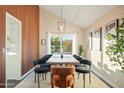 Cozy dining room with an outdoor view, and seating for eight guests at 17614 N 56Th Way, Scottsdale, AZ 85254