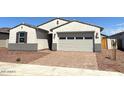 Beautiful single-story home featuring a two-car garage and low-maintenance landscaping at 24578 W Grenadine Rd, Buckeye, AZ 85326