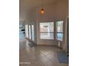 Bright living area with views to the outside pool at 518 W Beverly Ln, Phoenix, AZ 85023