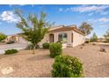 Inviting single-story home with desert landscaping and a well-maintained front yard at 10960 E Monte Ave # 199, Mesa, AZ 85209