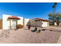 Attractive single-story home with desert landscaping, cacti, and a red tile roof at 1500 N Markdale -- # 8, Mesa, AZ 85201