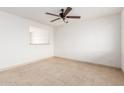 Spacious living room featuring tile flooring and lots of natural light at 6031 W Hearn Rd, Glendale, AZ 85306