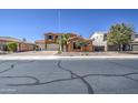Charming two-story home with a landscaped yard, a brick driveway, and an attached two-car garage at 3016 N Glenview --, Mesa, AZ 85213