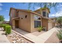 Exterior view showing desert landscaping and front entry at 7511 E Desert Vista Rd, Scottsdale, AZ 85255