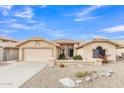 Charming home with desert landscaping, light-colored stucco, and a tile roof at 8096 E Lavender Dr, Gold Canyon, AZ 85118