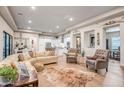 Spacious living room featuring neutral tones, hardwood floors, and an open-concept design at 39705 N 3Rd St, Phoenix, AZ 85086