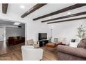 Bright living room featuring beamed ceilings, an open layout, and lots of natural light at 1226 E Fairmont Dr, Tempe, AZ 85282