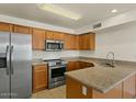 Kitchen featuring stainless steel appliances, tile flooring and granite counters at 1811 S 39Th St # 30, Mesa, AZ 85206