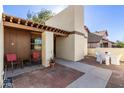 Outdoor patio with brick flooring and dining and seating area at 2407 W Paradise Ln, Phoenix, AZ 85023