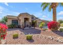Beautiful two-story home featuring desert landscaping, a welcoming private entrance, and a three-car garage at 8761 W Mary Ann Dr, Peoria, AZ 85382