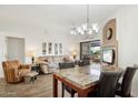 Open-concept living room showcasing natural light and dining area at 10401 N Saguaro Blvd # 130, Fountain Hills, AZ 85268