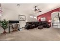 Open concept living area with a workstation and sliding door access to the pool at 1297 E Maddison St, San Tan Valley, AZ 85140