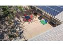 Enclosed brick patio, complete with an outdoor dining set and sunny sky view at 14633 N Boswell Blvd, Sun City, AZ 85351
