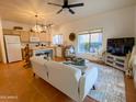 Bright living room features an open floor plan, modern furnishings, and lots of natural light at 16545 E Gunsight Dr # 103, Fountain Hills, AZ 85268