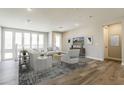 Bright living room with hardwood floors, neutral paint, modern furniture and lots of natural light at 2121 W Sonoran Desert Dr # 45, Phoenix, AZ 85085