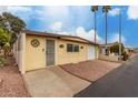 Charming single-story home with attached garage, desert landscaping, and security door at 6830 W Mckinley St, Phoenix, AZ 85043