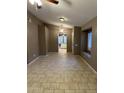 Spacious living room with tile flooring and natural light at 2634 N Saffron Cir, Mesa, AZ 85215