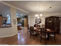 Elegant dining room with hardwood floors, chandelier, and traditional furnishings at 437 E Germann Rd # 152, San Tan Valley, AZ 85140