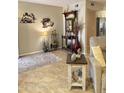 Cozy living room with a large window and decorative decor at 9231 W Elkhorn Dr, Sun City, AZ 85351