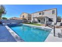 Spacious backyard with a pool, hot tub, trampoline, and plenty of room to play at 20867 N Grantham Rd, Maricopa, AZ 85138