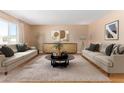 Staged living room with neutral paint, plush rug, and ample seating at 6409 E Duncan St, Mesa, AZ 85205