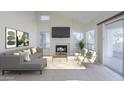 Cozy living room featuring a fireplace, large windows, and access to the outdoors at 11840 N 40Th Way, Phoenix, AZ 85028