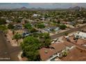 Neighborhood aerial view with tree-lined streets and mountain views at 1301 E Sheridan St, Phoenix, AZ 85006