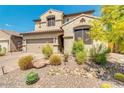 Charming two-story home featuring a tile roof and well-maintained landscaping at 3668 E Ficus Way, Gilbert, AZ 85298