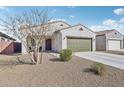 Charming single-story home features a well-maintained yard and an attached two-car garage at 45734 W Sky Ln, Maricopa, AZ 85139