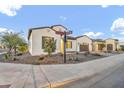 Inviting single-story home featuring lush landscaping and great curb appeal in a lovely neighborhood at 500 E Watermelon Ln, Queen Creek, AZ 85140